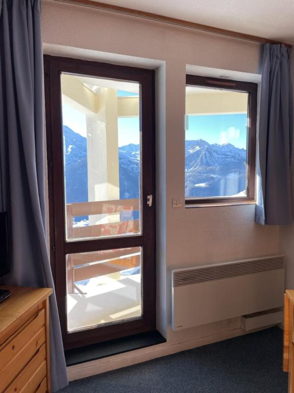 Les Bouquetins A appartement pied des pistes 13