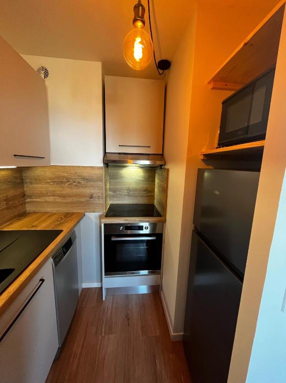 Mont Vallon Lodge Meribel Mottaret Skis aux pieds proche du centre et tout confort Parking gratuit et Linge fourni appartement pied des pistes 12