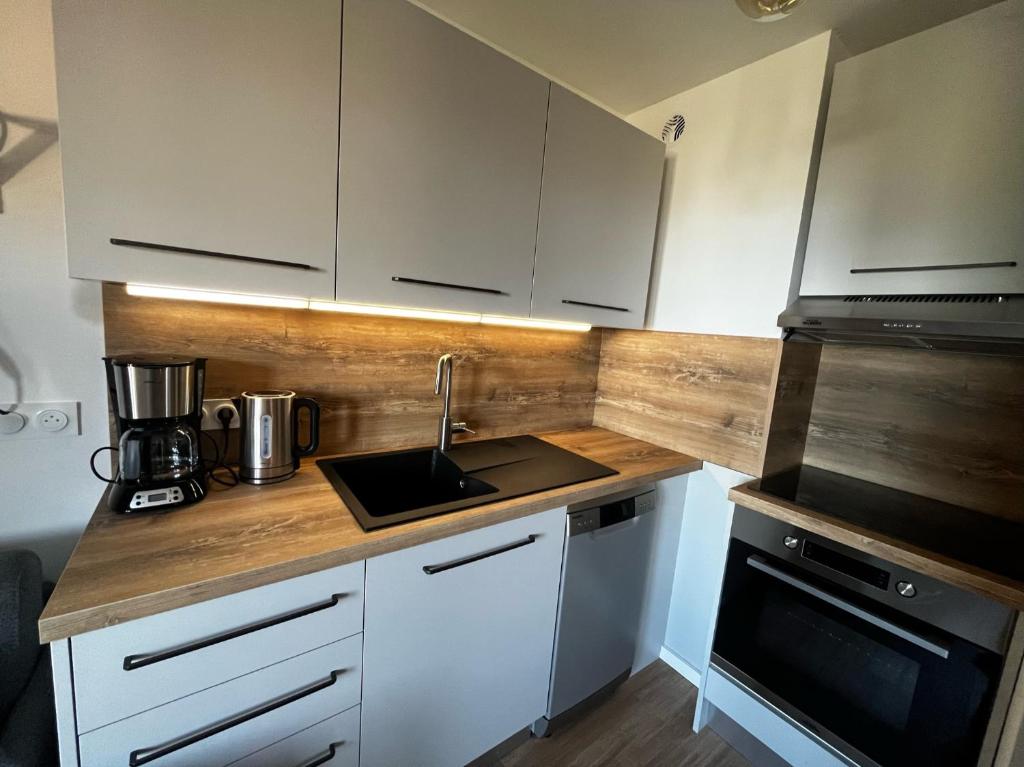 Mont Vallon Lodge Meribel Mottaret Skis aux pieds proche du centre et tout confort Parking gratuit et Linge fourni appartement pied des pistes 8
