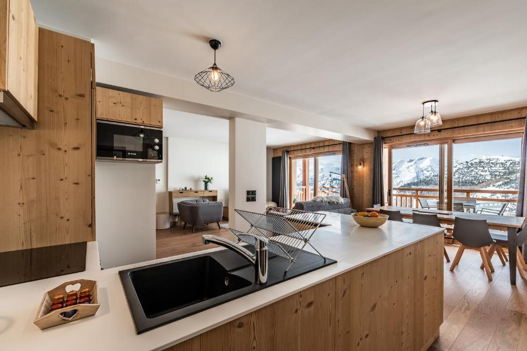 Residence Hameau de Clotaire Alpe dHuez by EMERALD STAY appartement pied des pistes 8