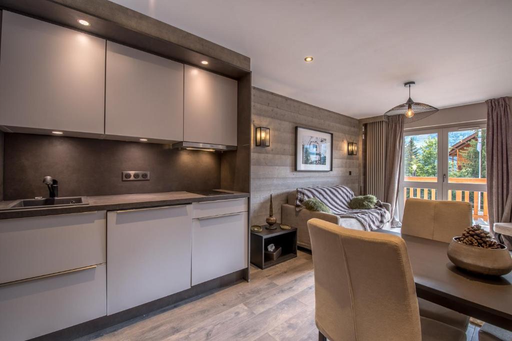 Superbe Appartement au Plateau Rond Point des Pistes Classe 3 Etoiles et Label Meribel appartement pied des pistes 1