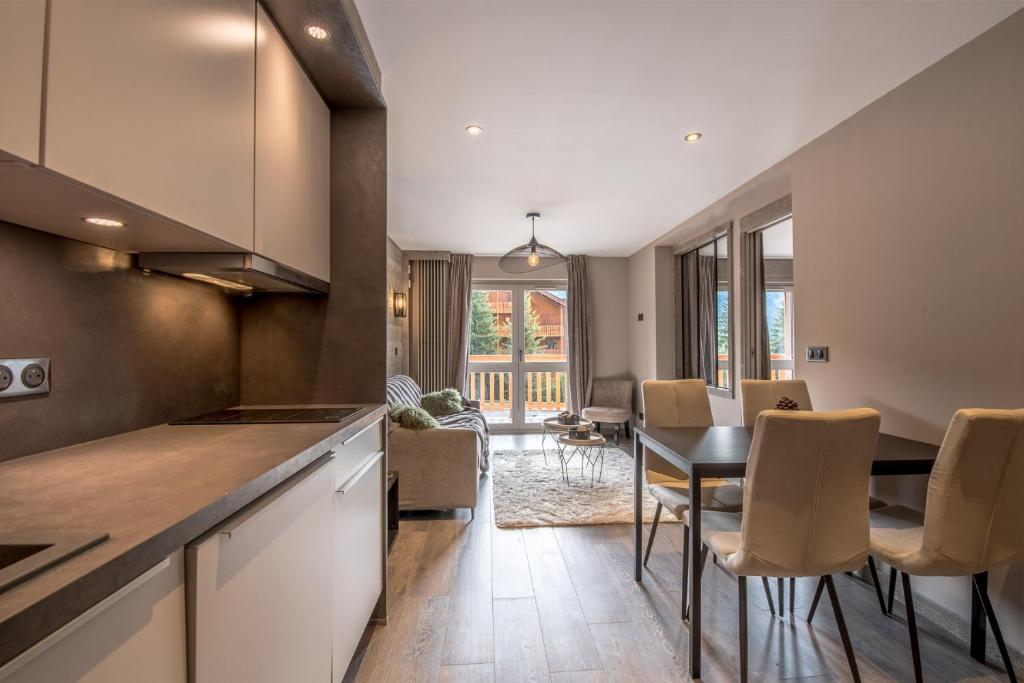 Superbe Appartement au Plateau Rond Point des Pistes Classe 3 Etoiles et Label Meribel appartement pied des pistes 3