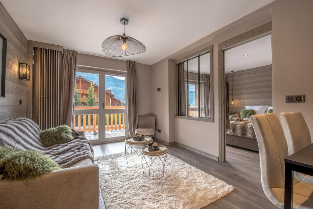 Superbe Appartement au Plateau Rond Point des Pistes Classe 3 Etoiles et Label Meribel appartement pied des pistes 5