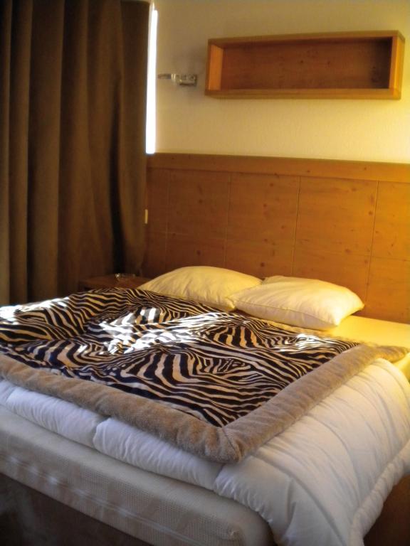 travelski home premium Residence Le Roc Belle Face appartement pied des pistes 13